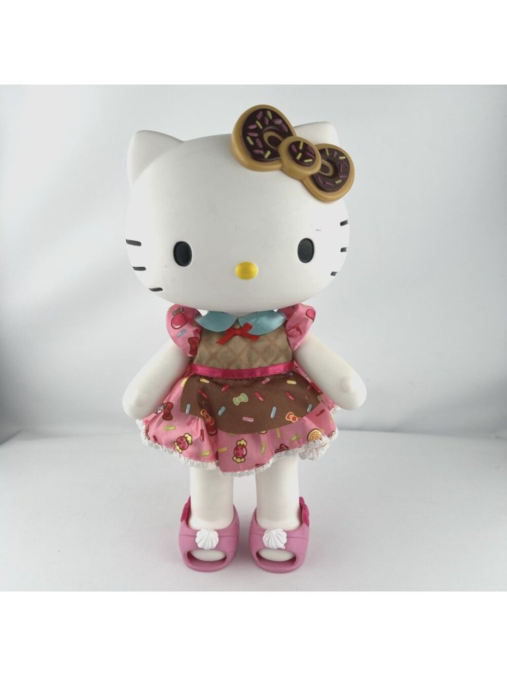 Sanrio Hello Kitty 13" Baker Vinyl Doll Poseable with Dress Shoes and Bow